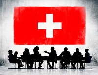 Switzerland flag and a group of business people.