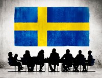 Group of Corporate People Having a Meeting Regarding the National Issues of Sweden