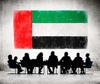 Business People in a Meeting with United Arab Emirates Flag