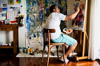 Black artist man doing artwork