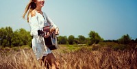 Hippie Woman Playing Music Concept
