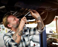Mechanic Screwdriver Fixing Garage Concept
