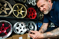 A mechanic holding a wrench