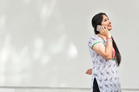 Indian woman is talking on the phone