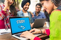 Woman using her laptop in a group study