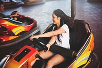 Girl Driving Bumper Car Happiness Enjoyment Concept