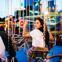 Woman Carnival Ride Riding Happiness Fun Concept