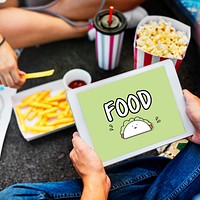 Tablet with a taco icon on screen and food in the background