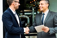 Corporate Businessmen Deal Handshake Concept