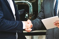 Corporate Businessmen Deal Handshake Concept