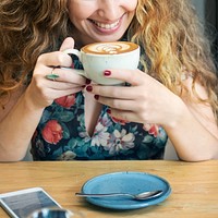 Young Woman Drinking Coffee Concept