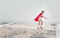 A boy playing superhero