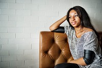 African american woman is sitting thoughtfully