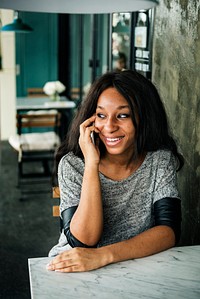 African American woman is talking on the phone