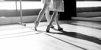 Feet of a ballerinas in a ballet studio