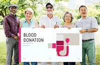 Group of senior adult holding banner of blood donation campaign