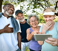 Seniors laughing at something on the phone