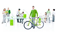 Businessman with a bicycle in a green office
