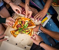 Friends sharing a pizza