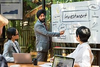 Business man in a turban doing a presentation