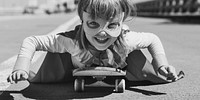 Little Girl Riding Skateboard Concept