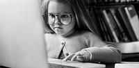 Little Girl Using Digital Laptop E-learning Concept