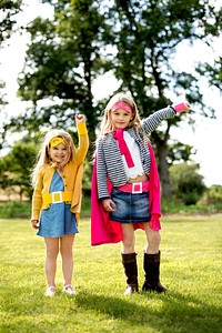 Kids in superhero costumes