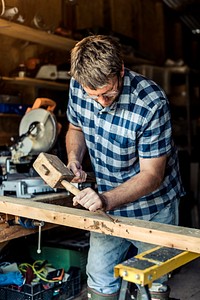 Artisan working with wood