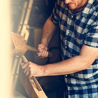 Artisan working with wood