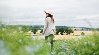 Spring desktop wallpaper background, woman in flower field