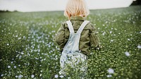 Spring mobile wallpaper background, kid in flower field