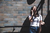 Beautiful asian woman on the phone