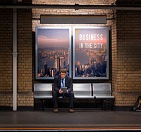 Businessman waiting in an underground train station