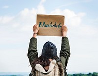 Woman holding paper board