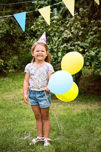 Kid enjoying party in the backyard