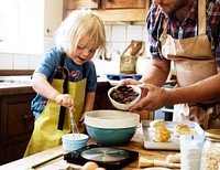 Kid baking with dad