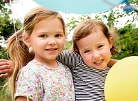 Portrait of smiling kids outdoors in summer days