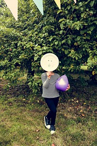 Girl Playing Balloon Garden Concept