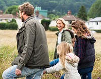 Family Walking Field Nature Togetherness Concept