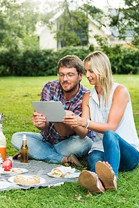 People Picnic Togetherness Relaxation DIgital Tablet Technology Concept
