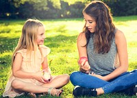 Sister Girls Talk Picnic Togetherness Outdoors Concept