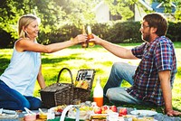 Happy family picnic in the park