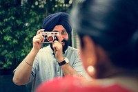 Indian Couple Taking Pictures Concept