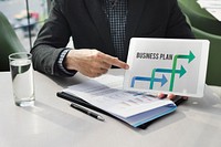 Businessman Explain Business Plan Using Tablet