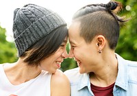 Lesbian couple dating in a park