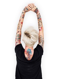 Caucasian tattooed woman stretching 