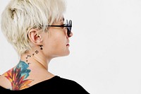Stylish woman with a tattoo on her neck
