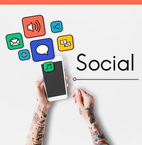 Tattooed hands holding a mobile phone with social media icons
