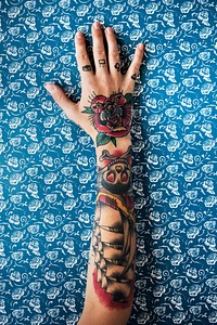 An arm with a lot of tattoos