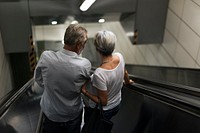Senior couple traveling around the city